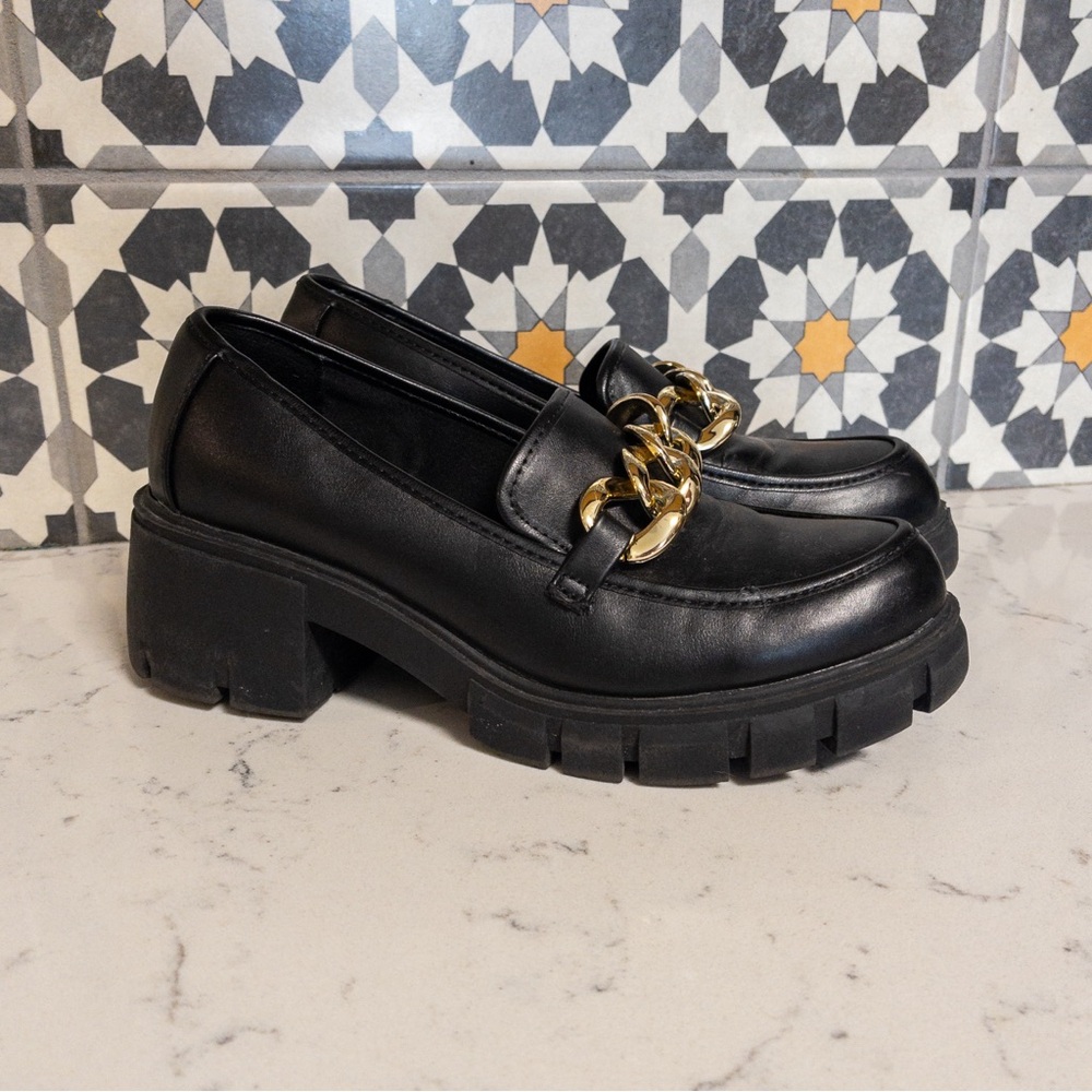 Steve Madden Black Chunky Loafers with Gold Accent